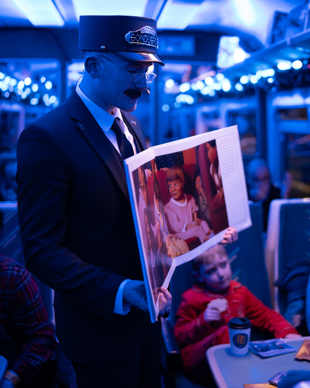 Conductor on board the polar express train ride london