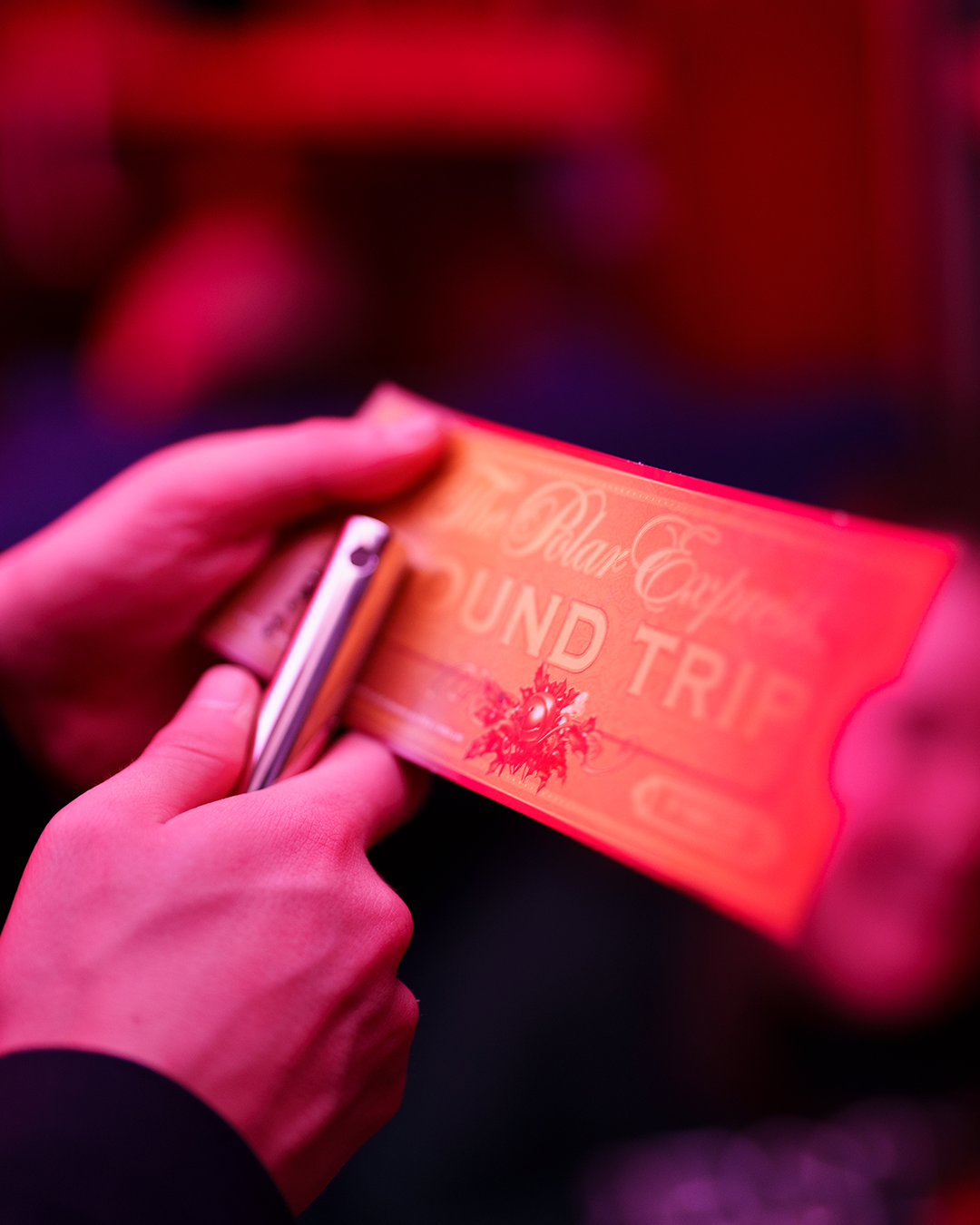 golden ticket clipped on board the polar express train ride