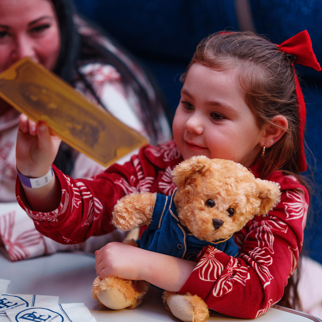 Chef waving on board The Polar Express Train Ride 